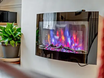a living room with a fire in a fireplace at 2 Bed in Keswick oc-sz417 in Keswick