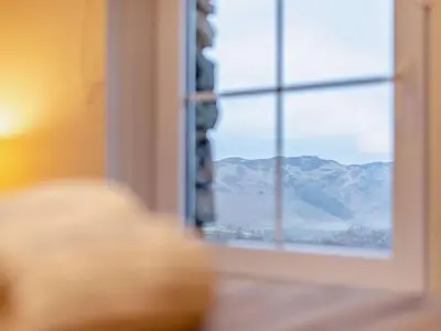 a window with a view of a mountain view at 3 Bed in Penrith oc-sz247 in Dockray