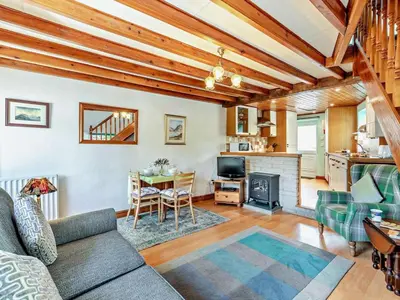 a living room with a couch and a table at 2 Bed in Keswick oc-sz145 in Braithwaite