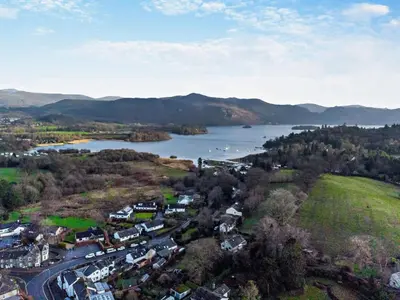 an aerial view of a town next to a lake at 2 Bed in Keswick oc-sz378 in Portinscale