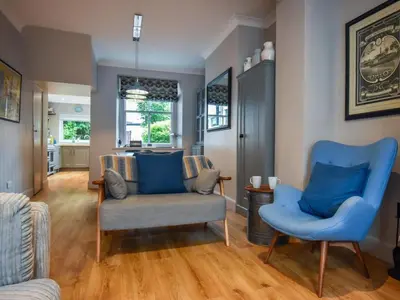a living room with two chairs and a couch at 3 Bed in Keswick oc-sz029 in Keswick