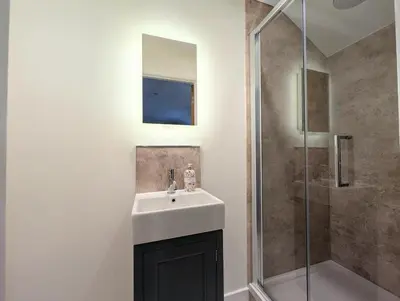 a bathroom with a sink and a shower at 3 Bed in Keswick oc-sz335 in Portinscale