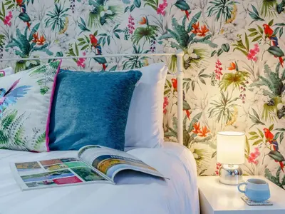 a bedroom with a bed with a book on it at 4 Bed in Seascale oc-85807 in Gosforth