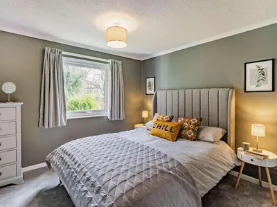 a bedroom with a large bed and a window at 2 Bed in Keswick oc-87092 in Keswick