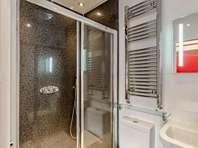 a bathroom with a shower and a sink at 6 Bed in Keswick oc-90333 in Keswick