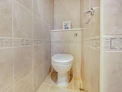 a bathroom with a white toilet in a shower at 1 Bed in Penrith oc-91812 in Dockray