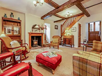 a living room filled with furniture and a fireplace at 1 Bed in Penrith oc-91812 in Dockray