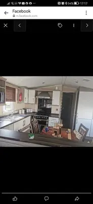 a screenshot of a kitchen with a picture of a kitchen at Birds Eye View in Mainsriddle