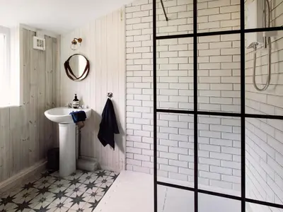 a bathroom with a toilet and a sink and a shower at Top Lodge in Carlisle