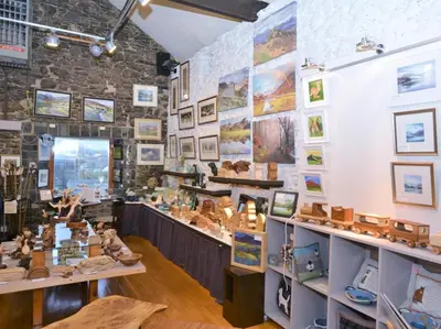 a store with lots of different types of shoes on display at 2 Bed in Keswick 28377 in Braithwaite