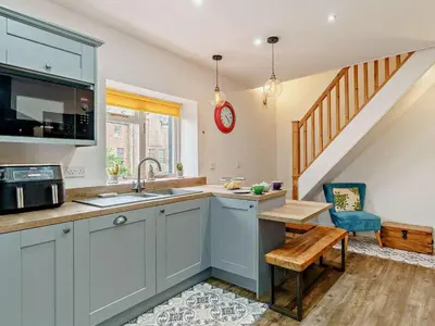 a kitchen with a sink and a microwave at 1 Bed in Cockermouth oc-93147 in Cockermouth