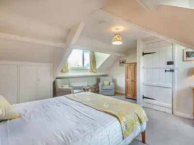 a bedroom with a large bed in a room at 3 Bed in Chapel Stile SZ161 in Chapel Stile
