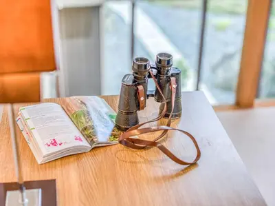 a pair of glasses and a book on a table at 4 Bed in Broughton Mills 75286 in Seathwaite
