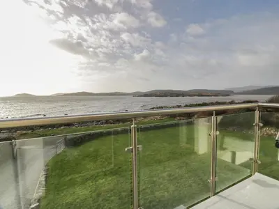 a view of the water from the balcony of a house at Merse End in Dalbeattie
