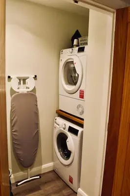 a bathroom with a washing machine and a washer at *Luxury Apartment 2min from City in Carlisle