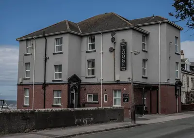 a building on the side of a street at Bailey Ground Lodge in Seascale