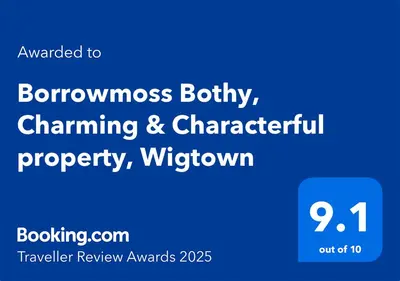 a blue sign with the words bronchoesbury churning andchantricularory at Borrowmoss Bothy, Charming & Characterful property, Wigtown in Wigtown