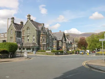 a row of houses on a street in a town at Baystones in Keswick