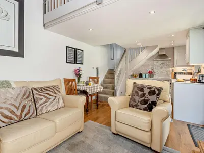 a living room with a couch and a table at 1 Bed in Bassenthwaite 91211 in Bassenthwaite Lake