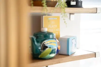 a shelf with a tea pot and a box on it at Serene Retreat in Chapel Stile by LetMeStay in Ambleside