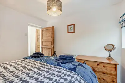 a bedroom with a bed and a dresser at 3 Bed in Bowness-on-Solway oc-p28797 in Bowness-on-Solway