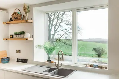 a kitchen with a sink and a window at Disdow House in Gatehouse of Fleet