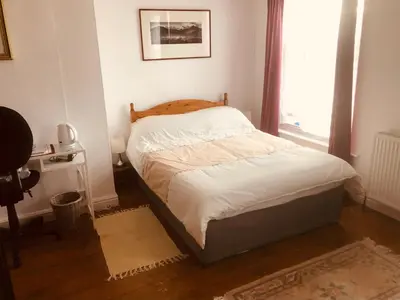 a small bed in a room with a window at Hope & Anchor, Hadrian's Wall, Port Carlisle, Solway Firth, Area of Natural Beauty in Port Carlisle