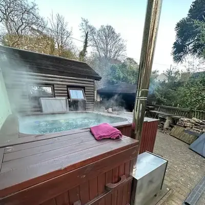 The hot tub by the waterfall - facilities included