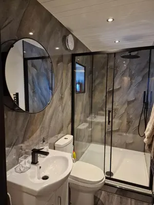 a bathroom with a sink and a toilet and a tub at The Drey by Blake view holidays, a peaceful boutique retreat, 3 miles from Ennerdale- small twin or king bed available in Arlecdon