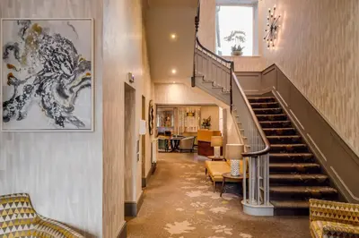 a staircase in a building with a stair case at Inn on the Square in Keswick