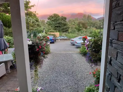 a view of a driveway with parked cars at Lakeside Country Guest House in Bassenthwaite Lake