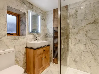 a bathroom with a sink and a shower at 2 Bed in Dalston 93820 in Dalston