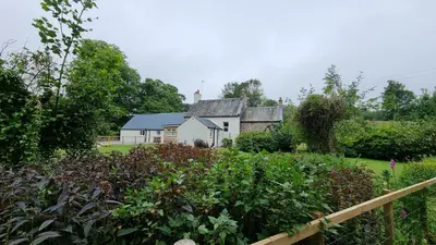a house with a garden in front of it at Lady Farm - Bargany in Girvan