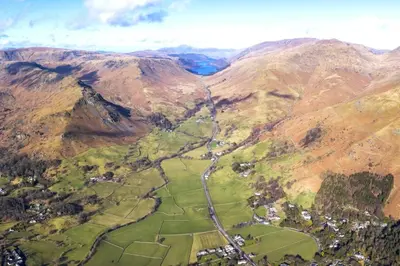 an aerial view of a valley in the mountains at Finest Retreats - Town Head Cottage in Grasmere in Grasmere