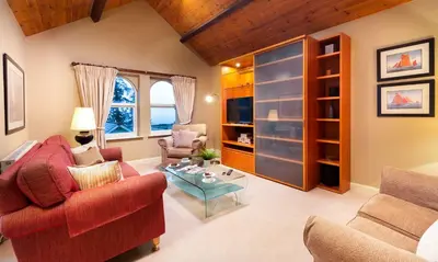 a living room with a couch and a table at Underscar - Latrigg in Keswick