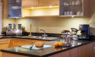 a kitchen with a sink and a counter top at Underscar - Manesty in Keswick