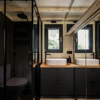 a bathroom with two sinks and a toilet at BonnieClyde in Beattock