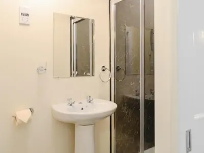 a bathroom with a sink and a shower at Dorn Rock View - Uk33918 in Portpatrick