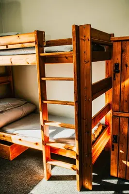 two sets of bunk beds in a room at Denton House Hostel in Keswick