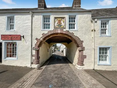 an entrance to a building with an archway at Bruce Cottage in Whithorn