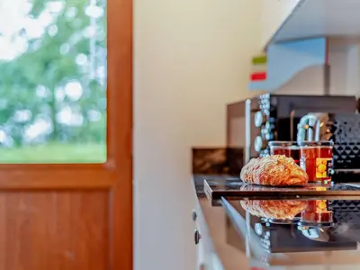 a plate of croissants on a counter in a kitchen at 1 Bed in Allonby 95499 in Allonby