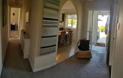 a hallway of a home with a dining room at Doonhill in Portpatrick in Portpatrick