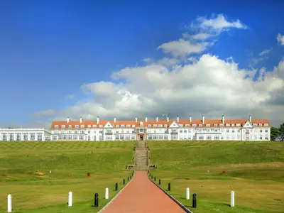a large white building with a red roof at Royal Dornoch - Ukc6918 in Turnberry
