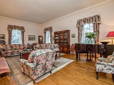 a living room filled with furniture and a piano at Country Home on Private Estate in Minishant