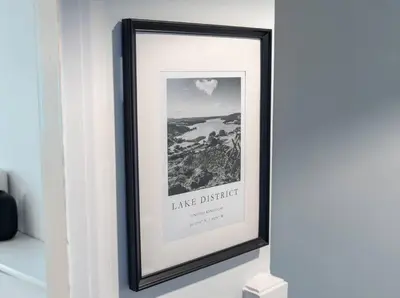 a picture of a framed picture of a lake district at Modern & Stylish 2 Bed Home in Whitehaven in Whitehaven
