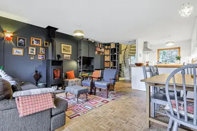 a living room with a couch and a table at Stylish retreat in Langdale in Chapel Stile