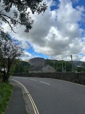 an empty road with at The White Lion Inn in Penrith