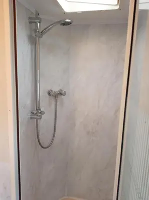 a shower stall with a shower head in a bathroom at Cairnryan - Loch Ryan View in Cairnryan