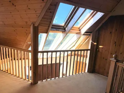 an empty room with a large skylight in a house at Beautiful 5BR House near Gretna Green with Garden - Pass the Keys in Kirkpatrick Durham