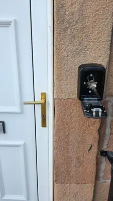 a bird is sticking out of a door at Quay cottage Annan in Annan